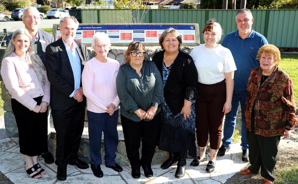 Caption – Spencer family descendants City of Gosnells Mayor Terresa Lynes, Glenis  Cruickshank and Valerie Fieldgate, with Freeman of the City of Gosnells Patricia Morris,  City of Gosnells Councillors Diane Lloyd, Peter Abetz and Glenn Dewhurst, and Member  for Cannington Bill Johnston with one of the new signs telling the story of the Spencer  family installed at Oak Tree Court in Langford