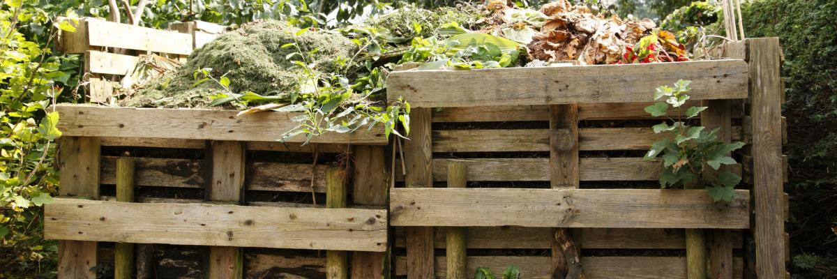 Two large wooden composting crates/pallets