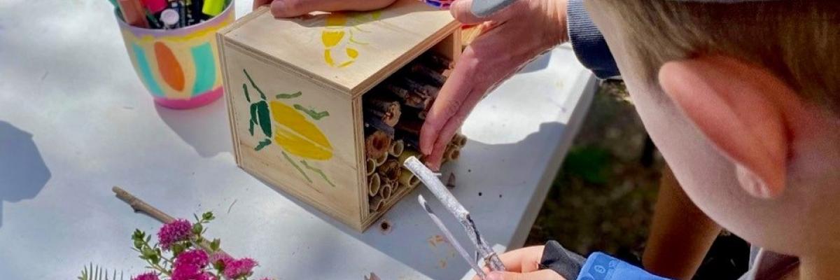 child making bug hotel